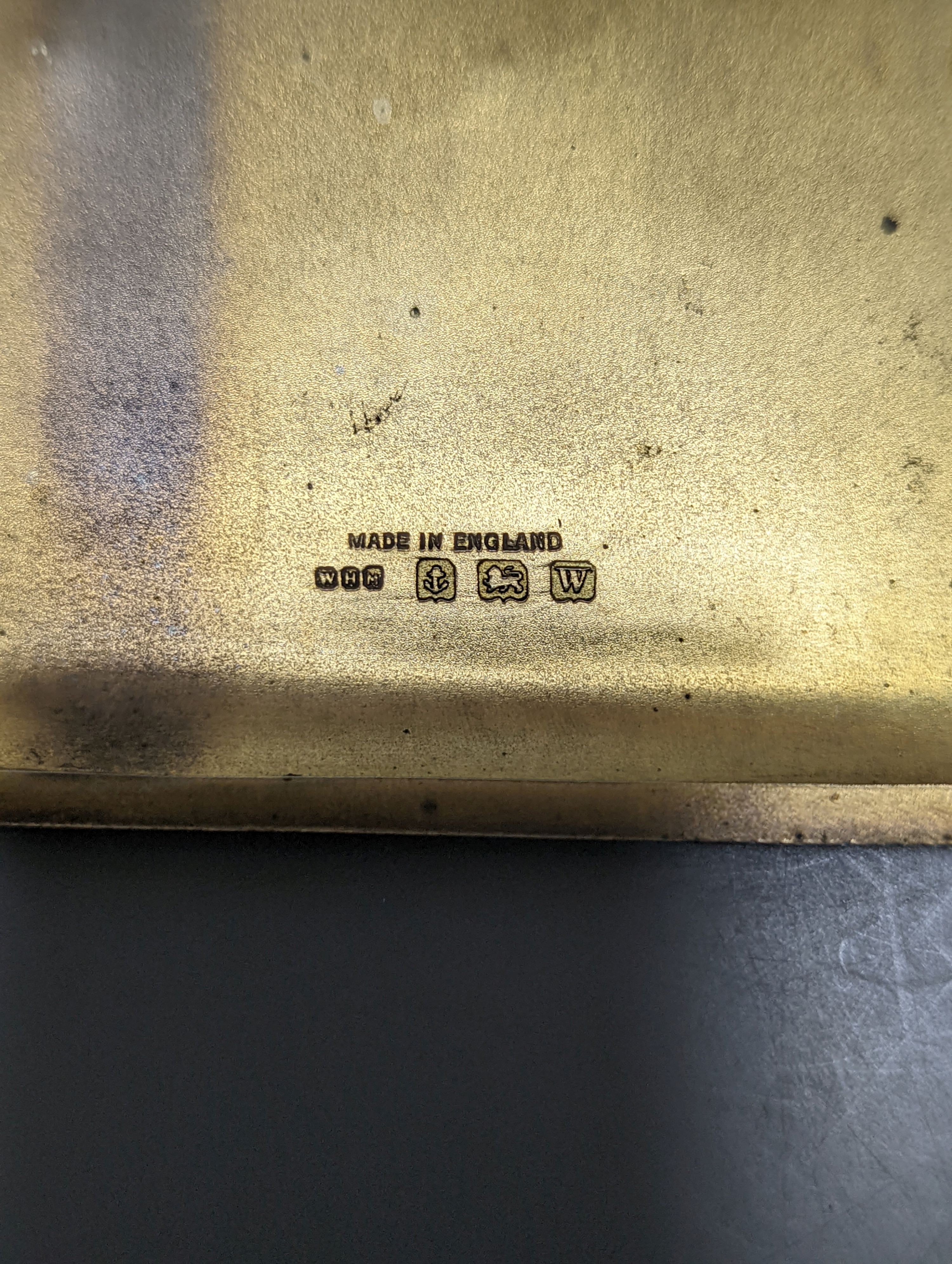 A George V engine turned silver cigarette case, 11.3cm, together with an 800 standard white metal mounted cigarette box.